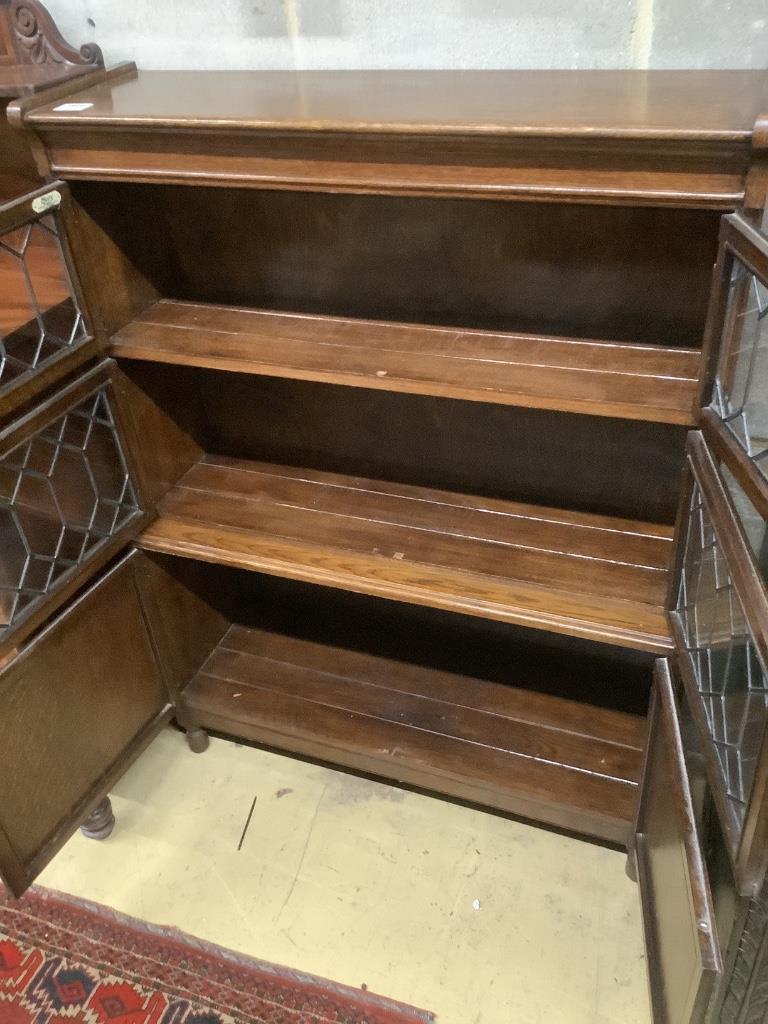 A 1920's leaded oak sectional bookcase, width 90cm